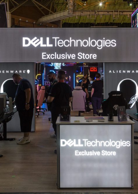 Dell Technologies Exclusive Store booth at Gameathlon 2024, a gaming exhibition, showcasing Alienware gaming chairs with people interacting and exploring the gaming setups.
